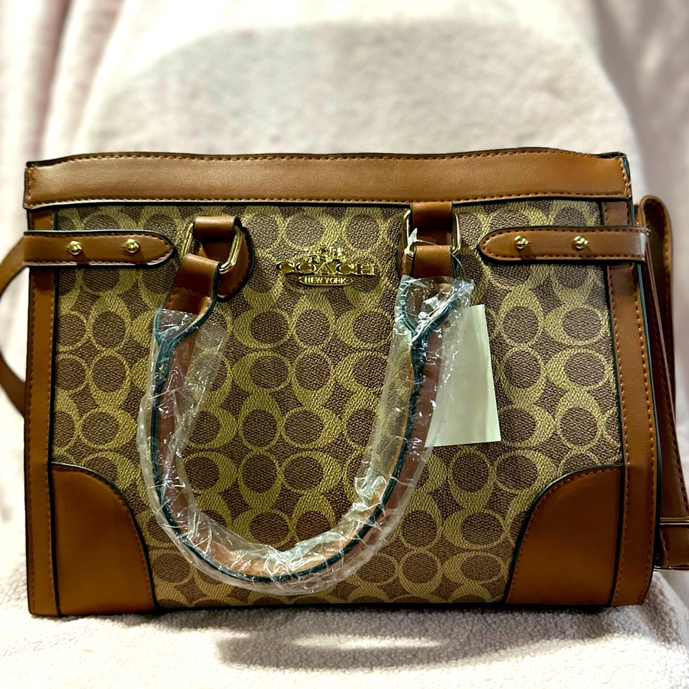 Hand bag/purse with sling